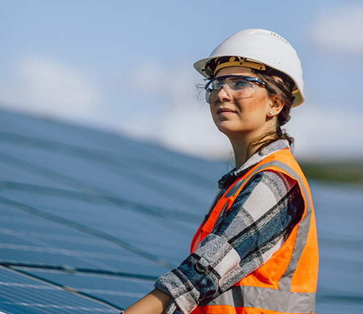 Woman pondering Aquila's better approach to EPC in a solar farm