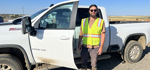 solar professional at truck door